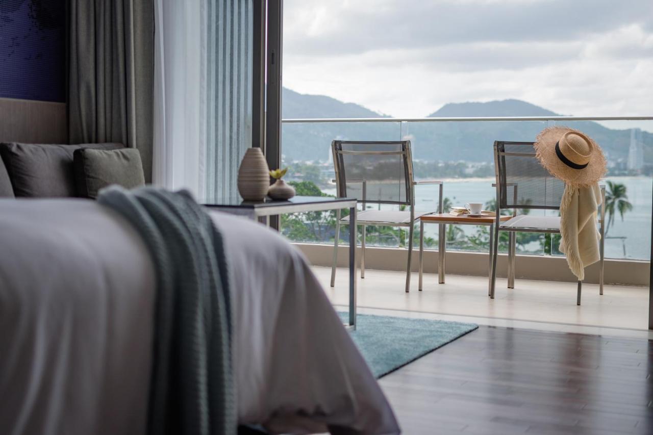 Oceanfront Beach Resort - Sha Extra Plus Patong Exterior foto A bedroom at The View