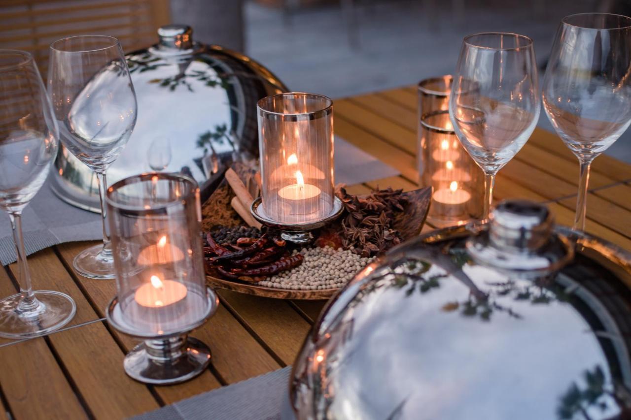 Oceanfront Beach Resort - Sha Extra Plus Patong Exterior foto A table set for Shabbat