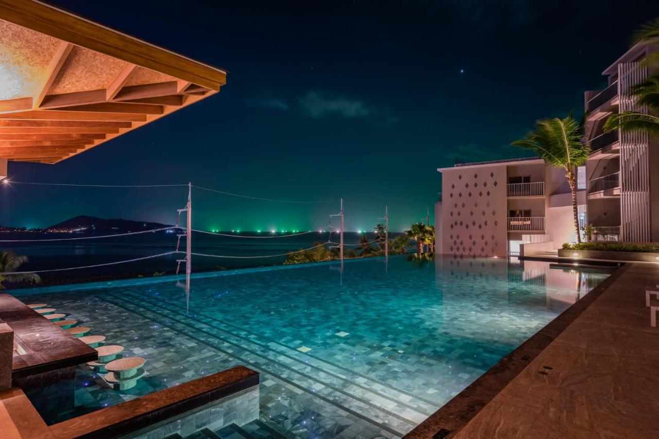 Oceanfront Beach Resort - Sha Extra Plus Patong Exterior foto Infinity pool at the resort