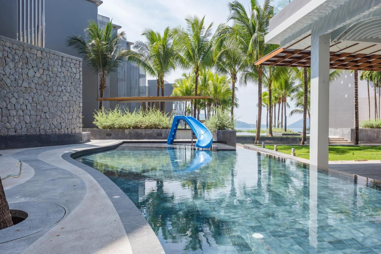 Oceanfront Beach Resort - Sha Extra Plus Patong Exterior foto The swimming pool at the resort