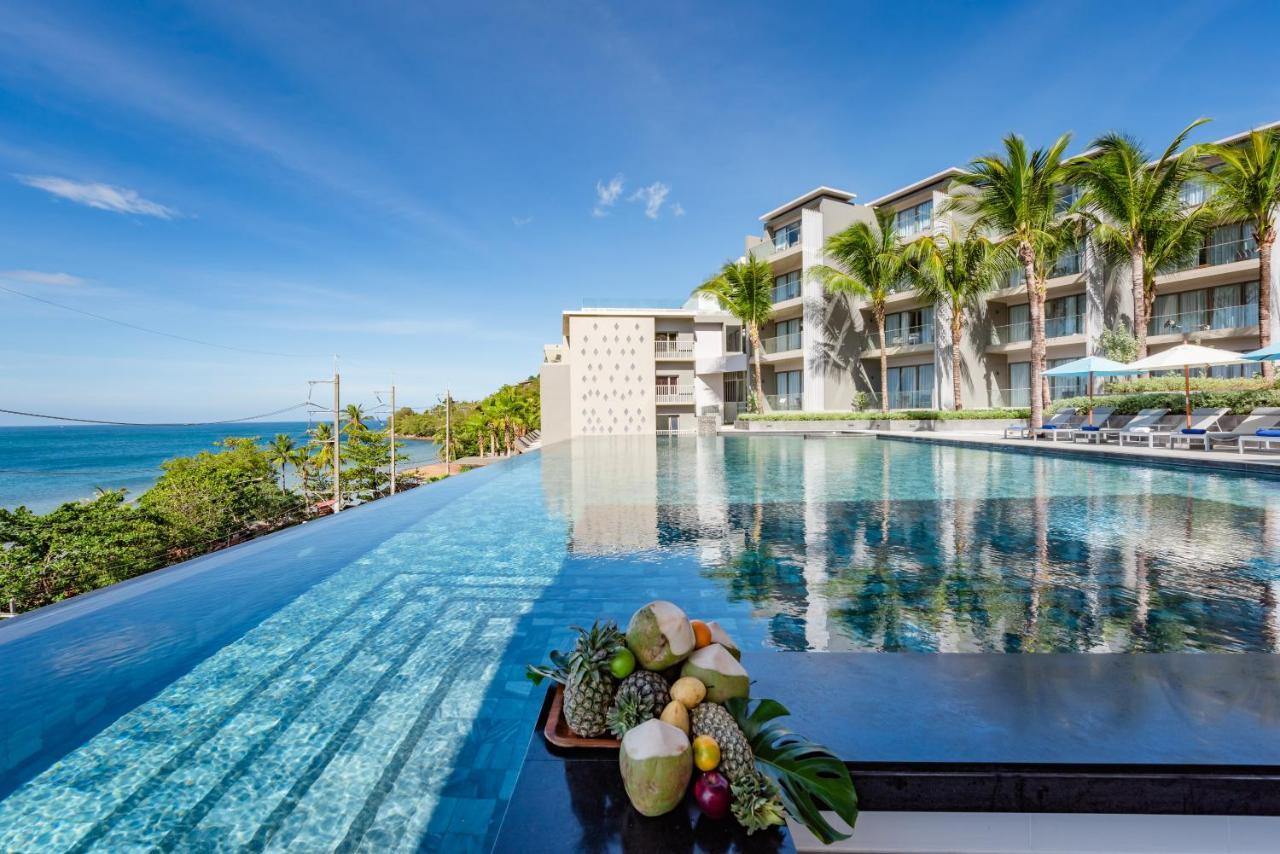 Oceanfront Beach Resort - Sha Extra Plus Patong Exterior foto The resort's infinity pool